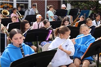Students playing instruments outside. thumbnail265999